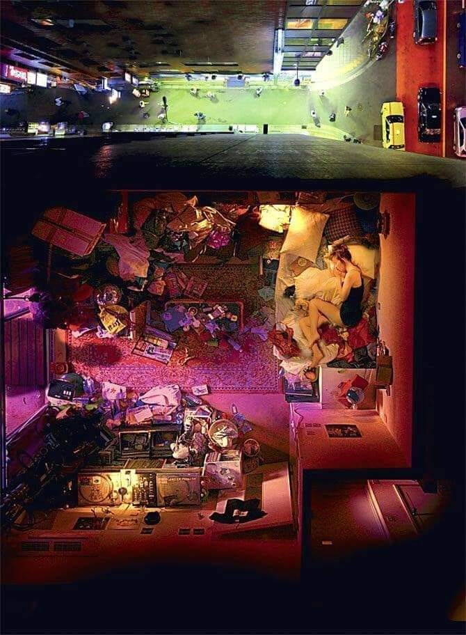This meme is a split-screen image of a room in a state of chaos (top) and a room that has been completely cleaned and organized (bottom). The text "I'm not lazy, I'm just on energy-saving mode" appears in the top image, implying that the person is not intentionally avoiding work, but rather conserving energy to avoid doing it.